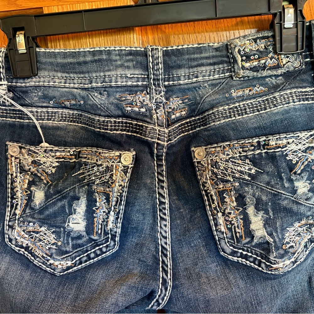 Grace Distressed Blue Jeans with Embellished Pockets